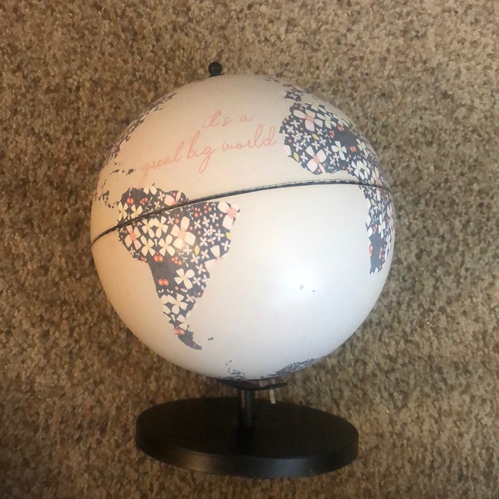 Rotating “it’s a great big world” globe decor.